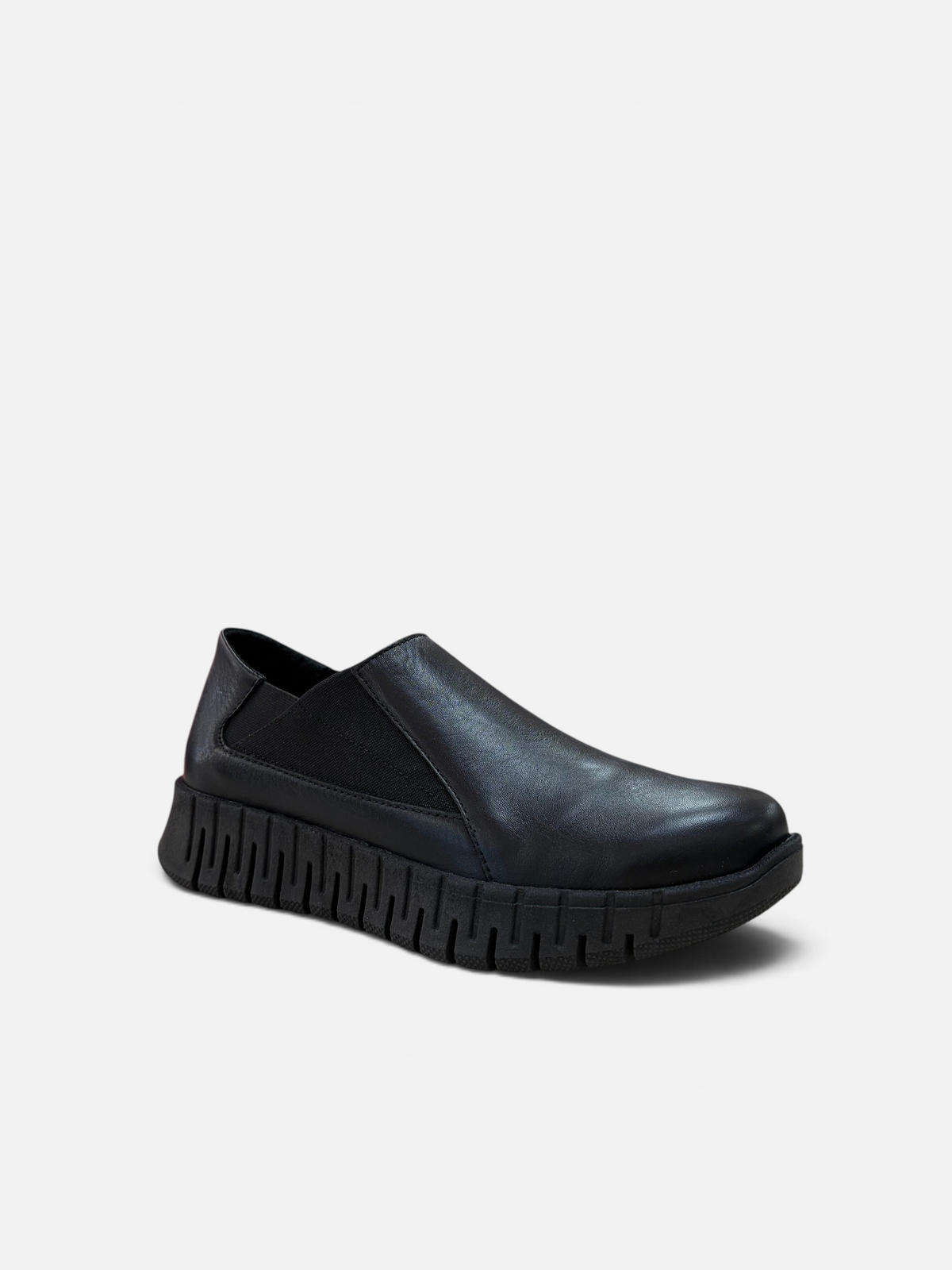 Scarpa slip-on Easy'n Rose in pelle nera con suola platform dentellata, disponibile presso Alex Calzature